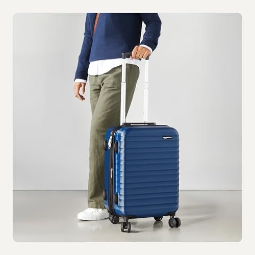 Amazon Basics 21" Hardside Carry-On Luggage, Hardshell Suitcase With Wheels, Expandable For Up to 25% More Space, With Scratch-Resistant Surface, Four Multi-directional Wheels, Navy Blue - Image 3